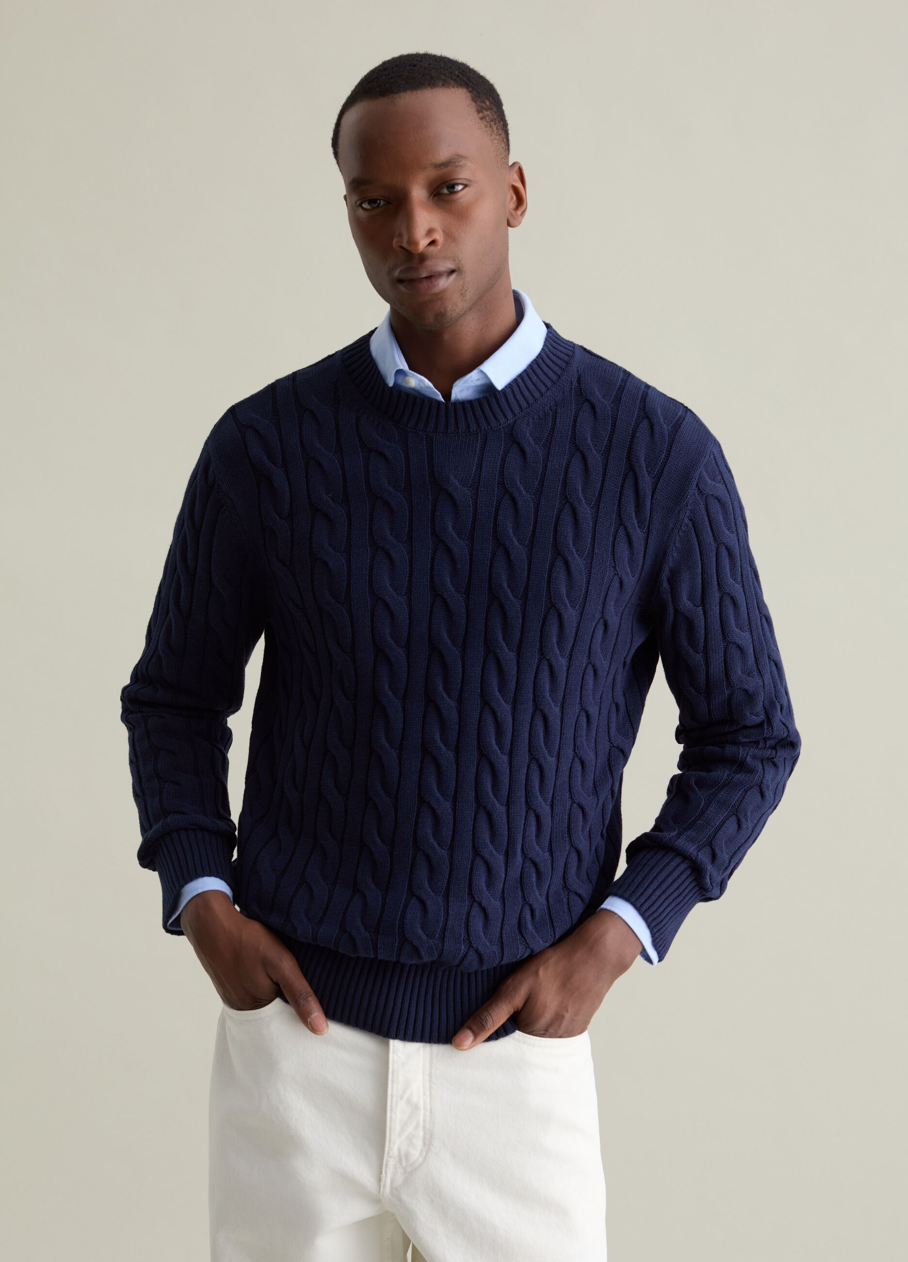 Pullover con lavorazione a treccia