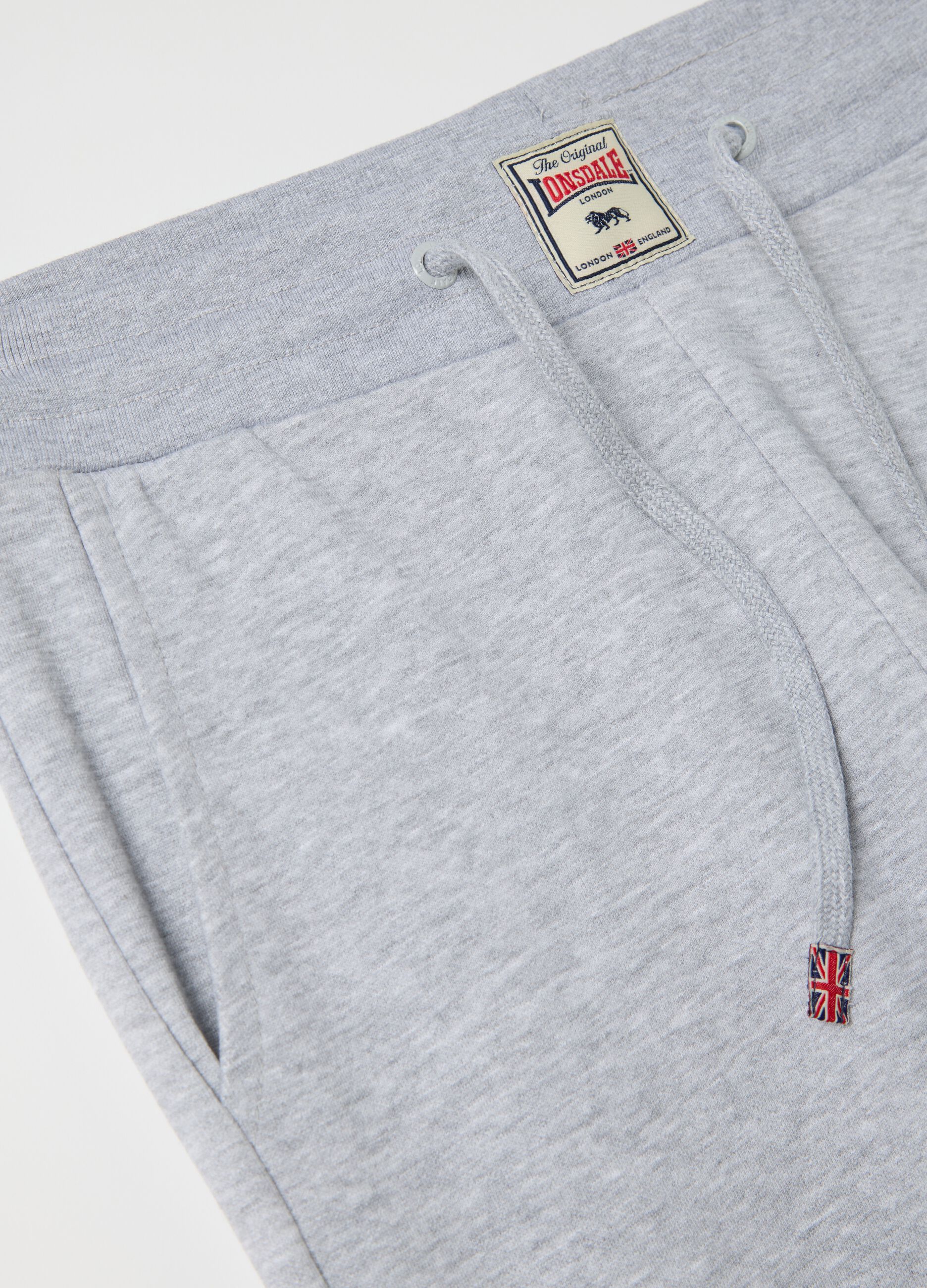Light grey joggers in fleece with logo print
