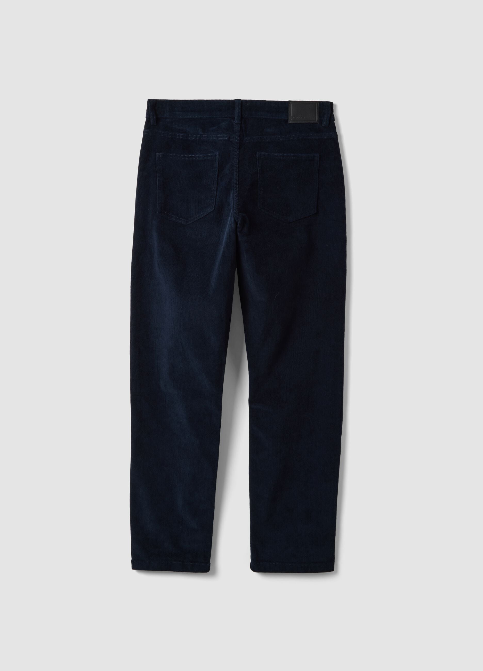 Pantaloni blu in cotone elasticizzato a coste slim fit