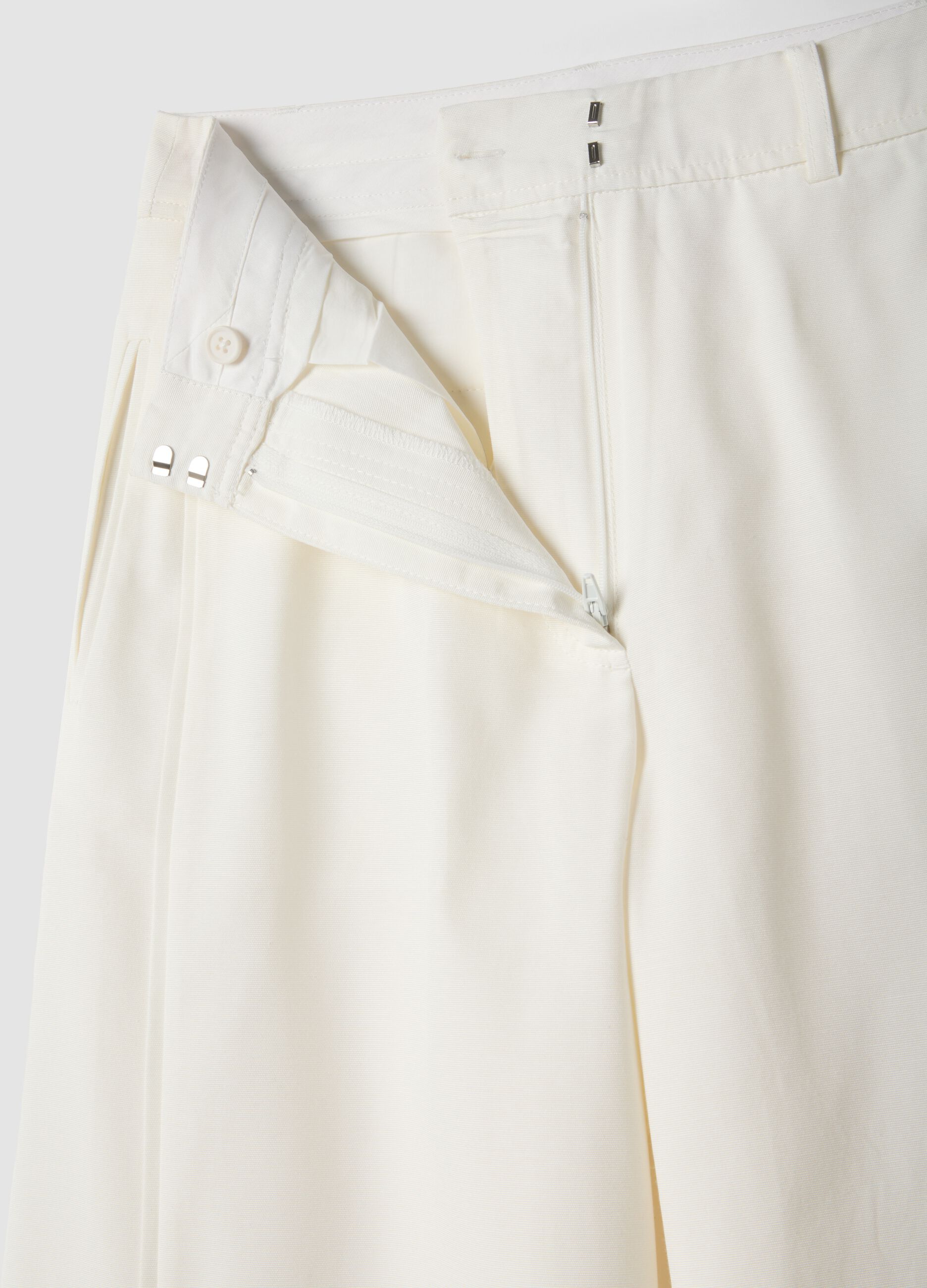 White cotton blend flare trousers with regular waist