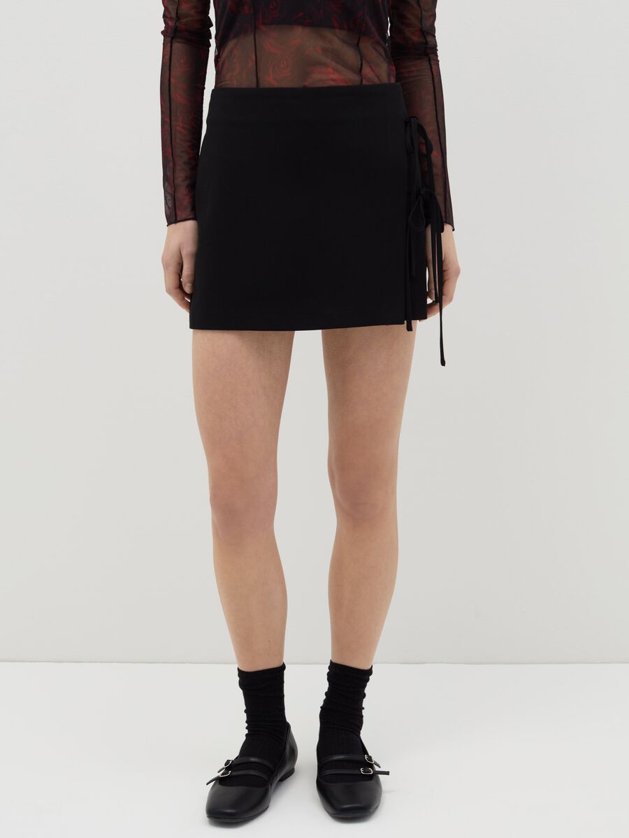 Wraparound miniskirt with laces_1