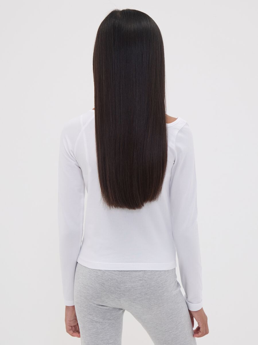 T-shirt bianca in cotone organico elasticizzato con cut-out per ragazza_2