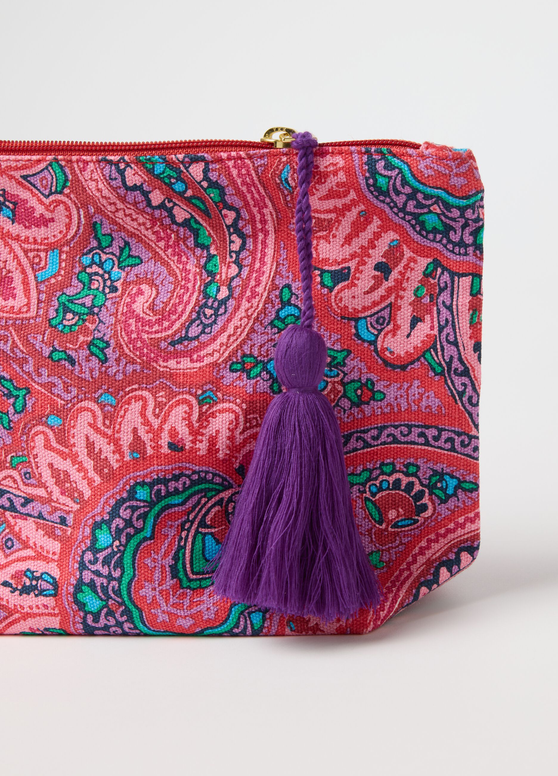 Clutch bag with tassel and paisley print