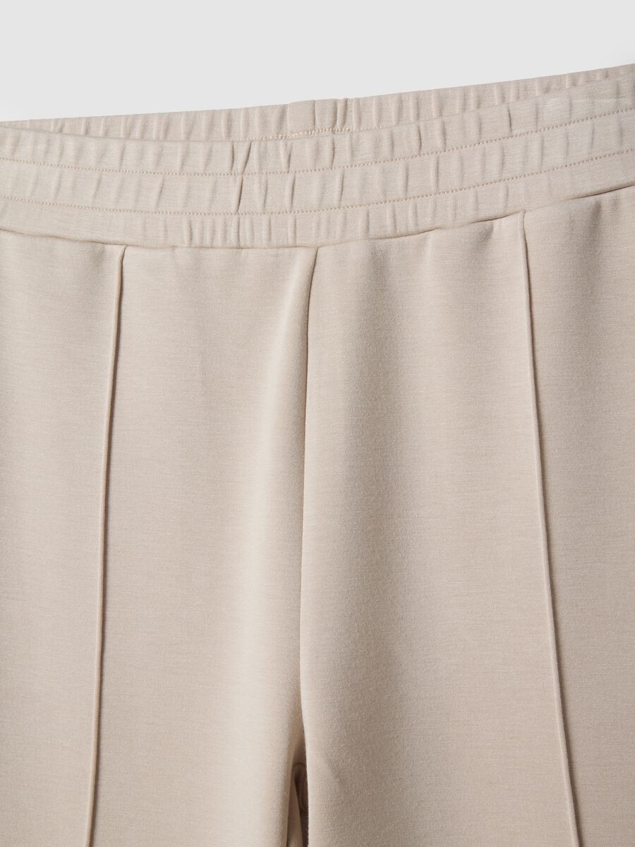 Beige wide leg trousers in stretch modal blend_5
