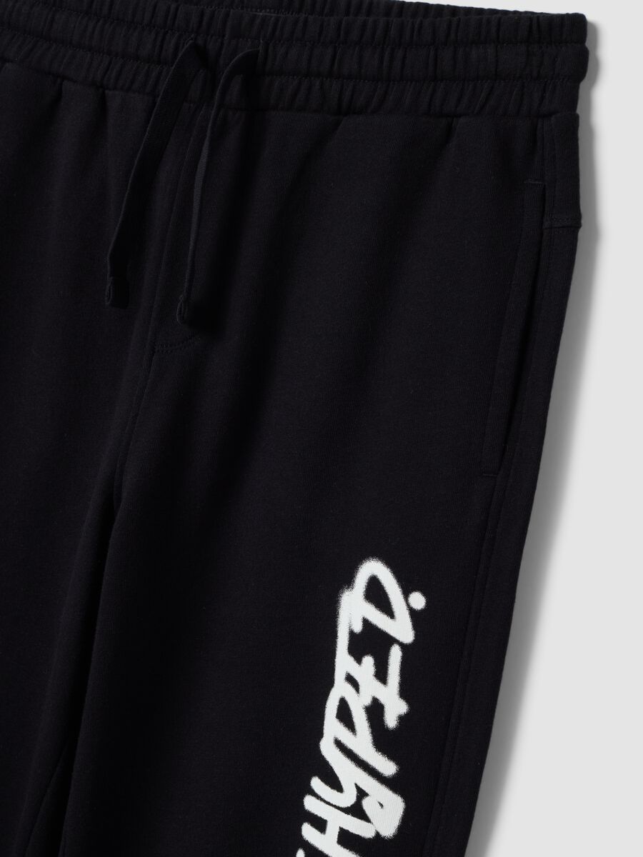 Pantaloni jogger over fit blu in puro cotone con scritta "Get Hyped" per ragazzo_4