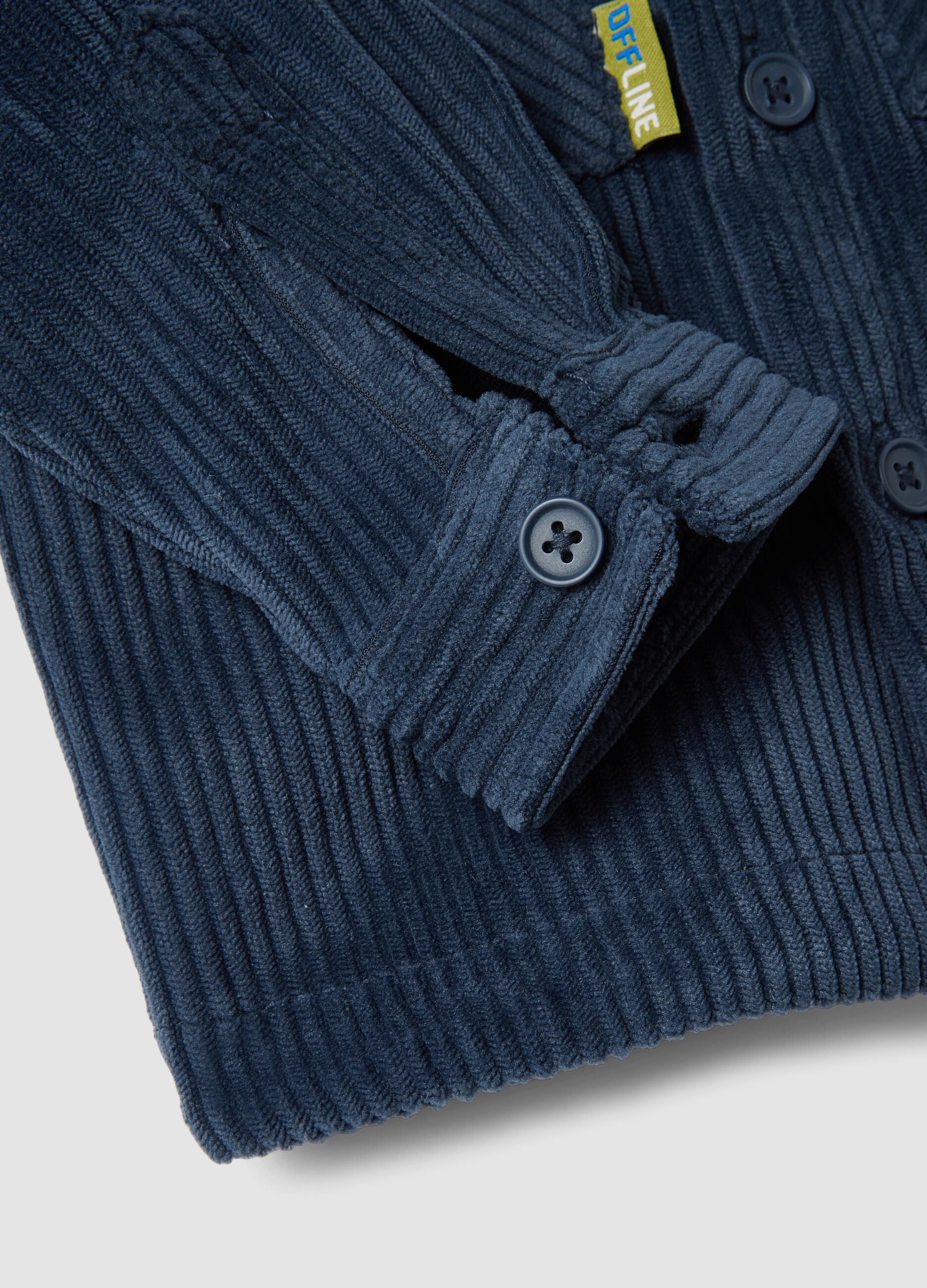 Blue ribbed shacket with buttons and classic collar