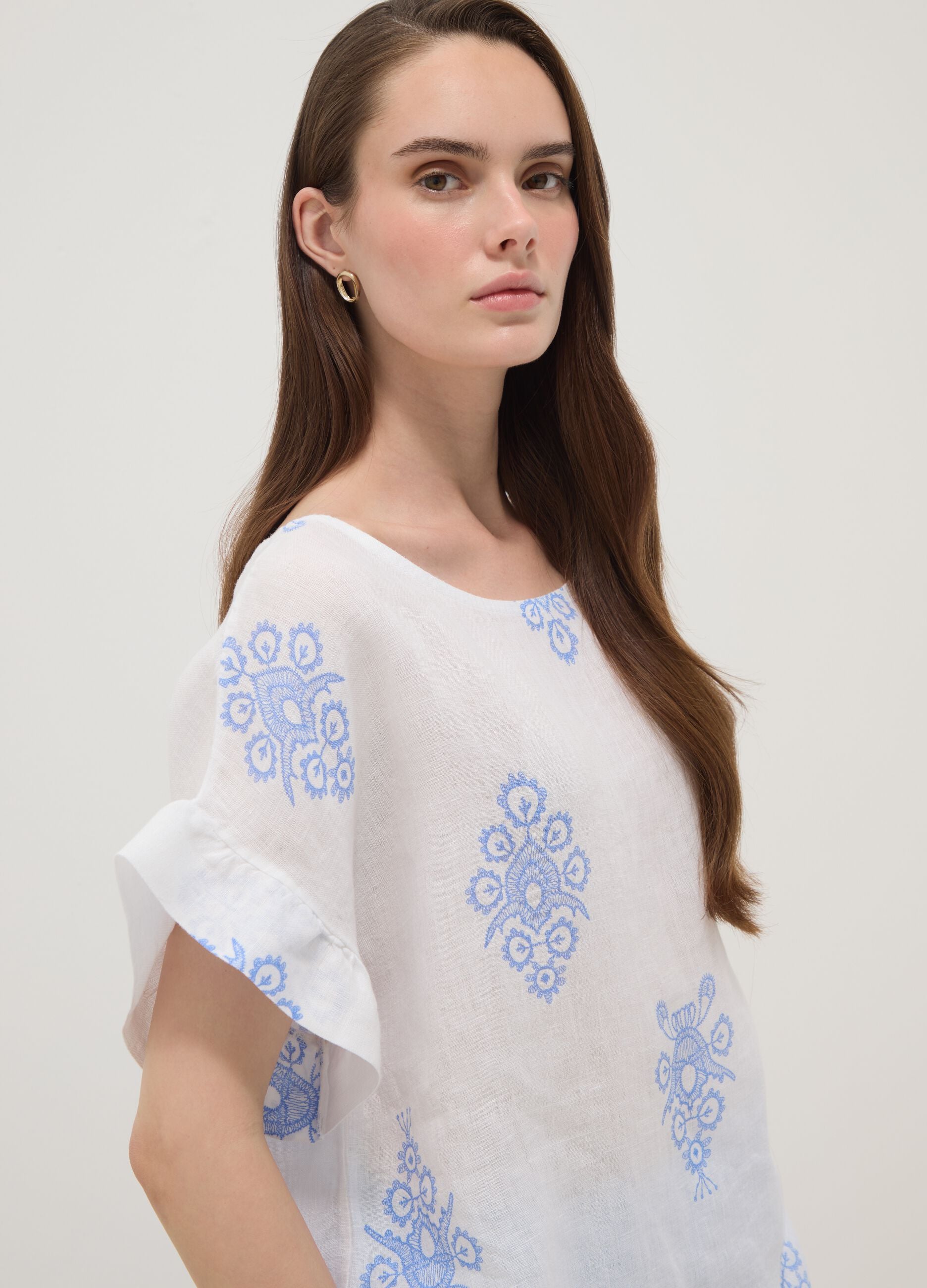 White pure linen blouse with embroidery and ruffle sleeves, regular fit