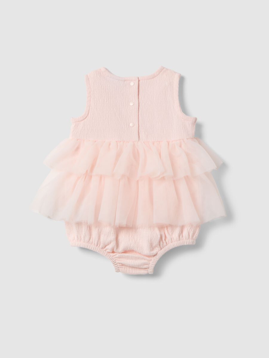 Pagliaccetto in cotone elasticizzato rosa da neonata con balze_1