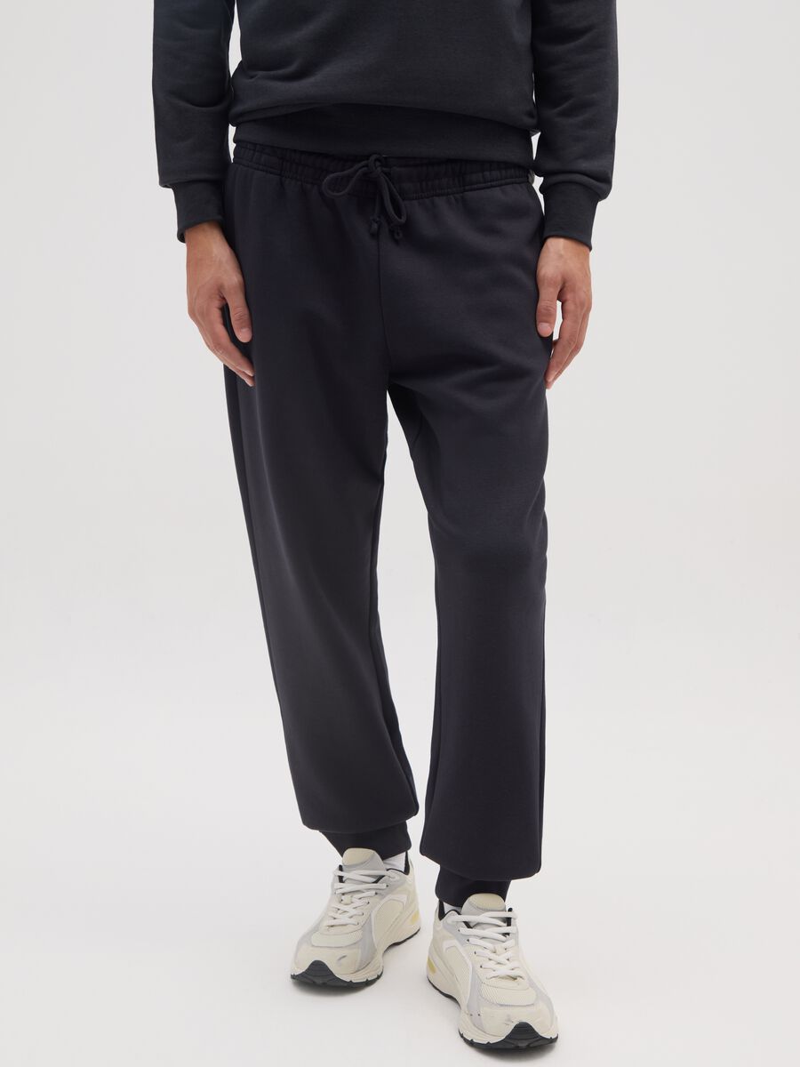 Black cotton blend regular fit trousers_1