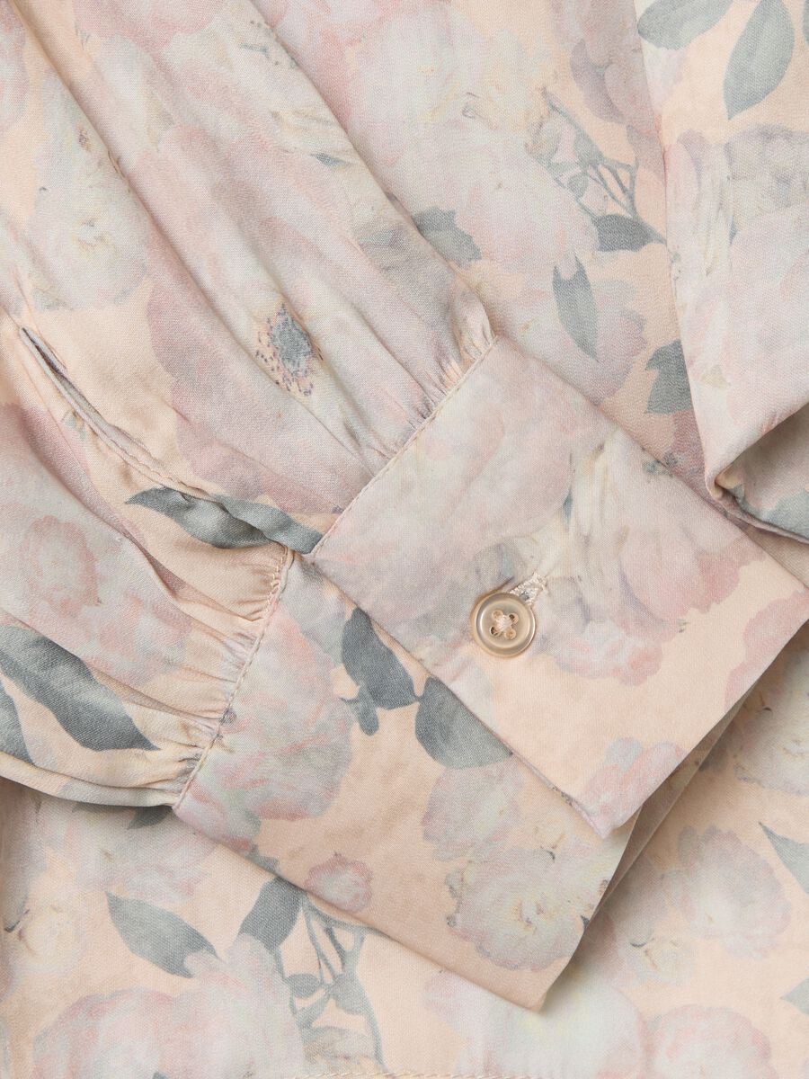 Blusa beige in fantasia floreale con fiocco_1