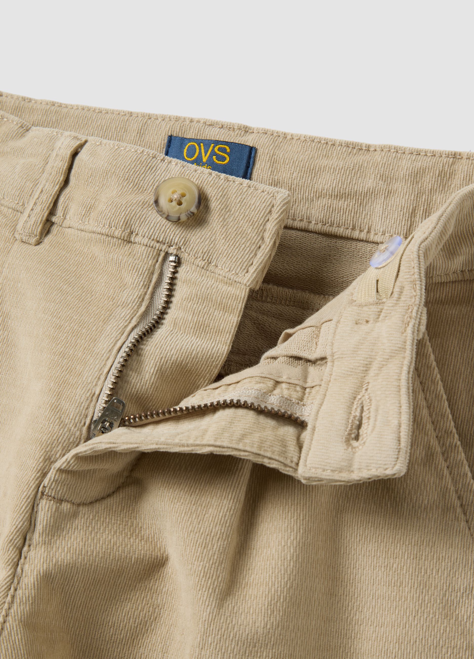 Pantaloni chino beige in cotone elasticizzato a coste
