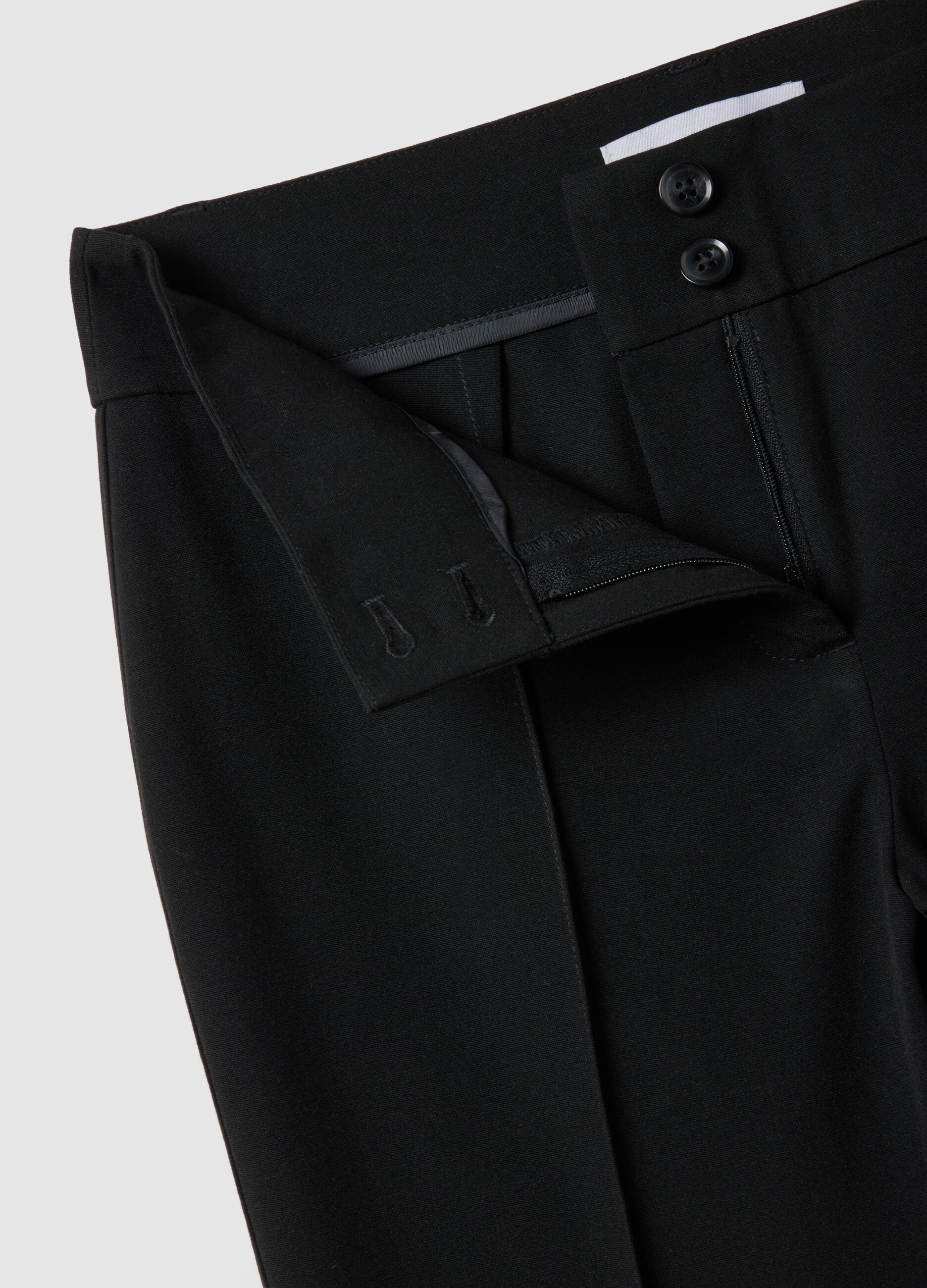 Pantaloni in tessuto elasticizzato neri flare fit