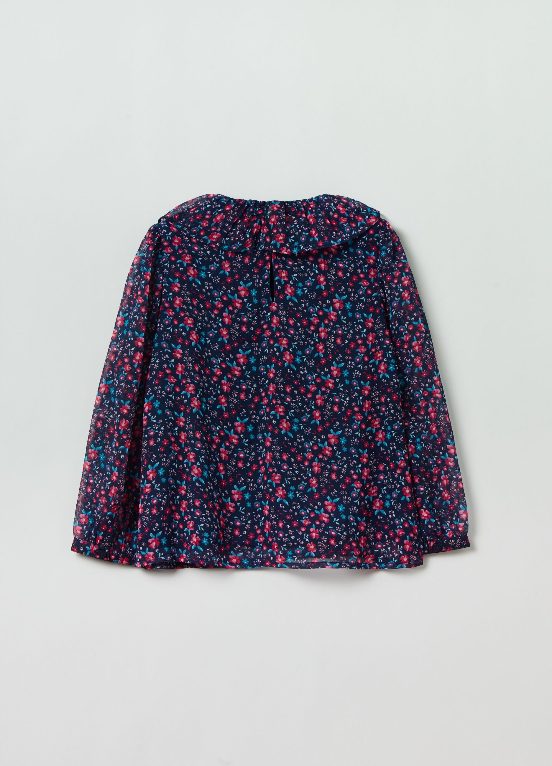 Blusa floreale con colletto a fiore