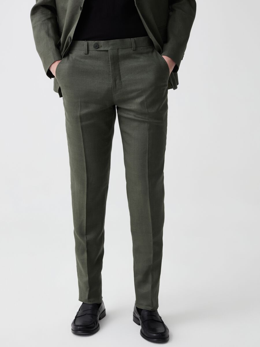 Slim-fit trousers in solid colour linen_1