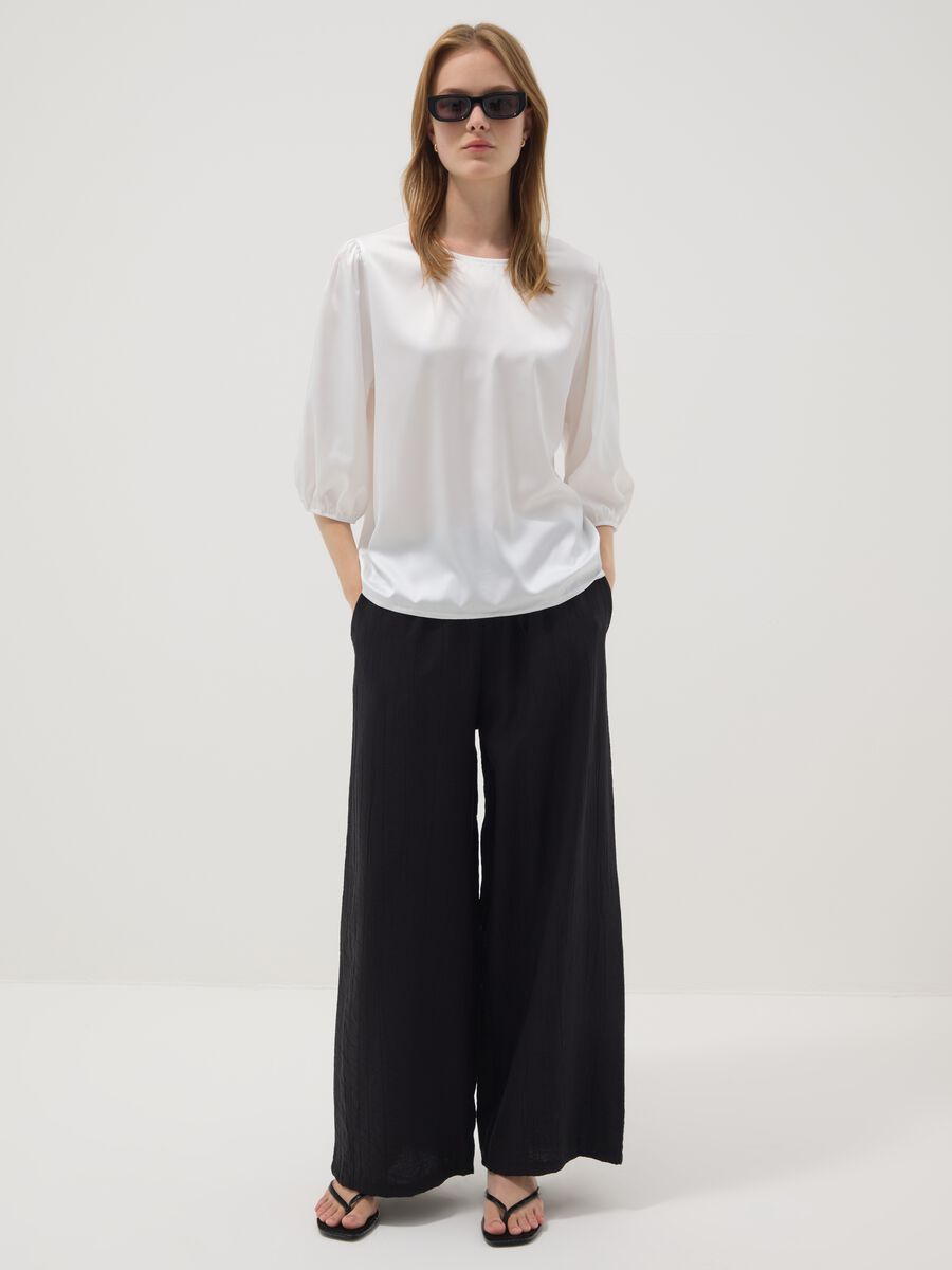 Black palazzo trousers in a viscose blend_1