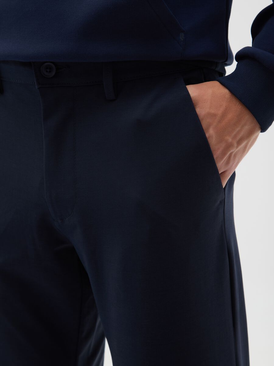 Blue cotton blend regular fit chino trousers_3