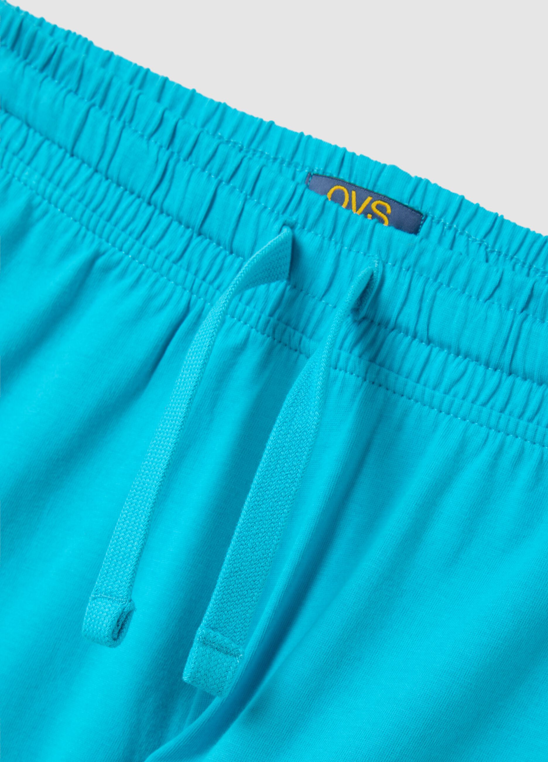 Boys’ light blue shorts in 100% cotton with regular waist