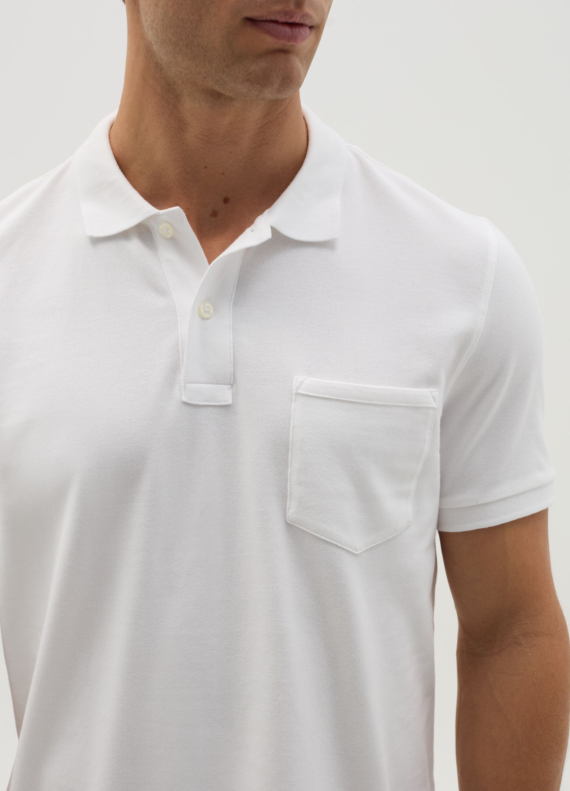 Stretch cotton polo shirt with pocket