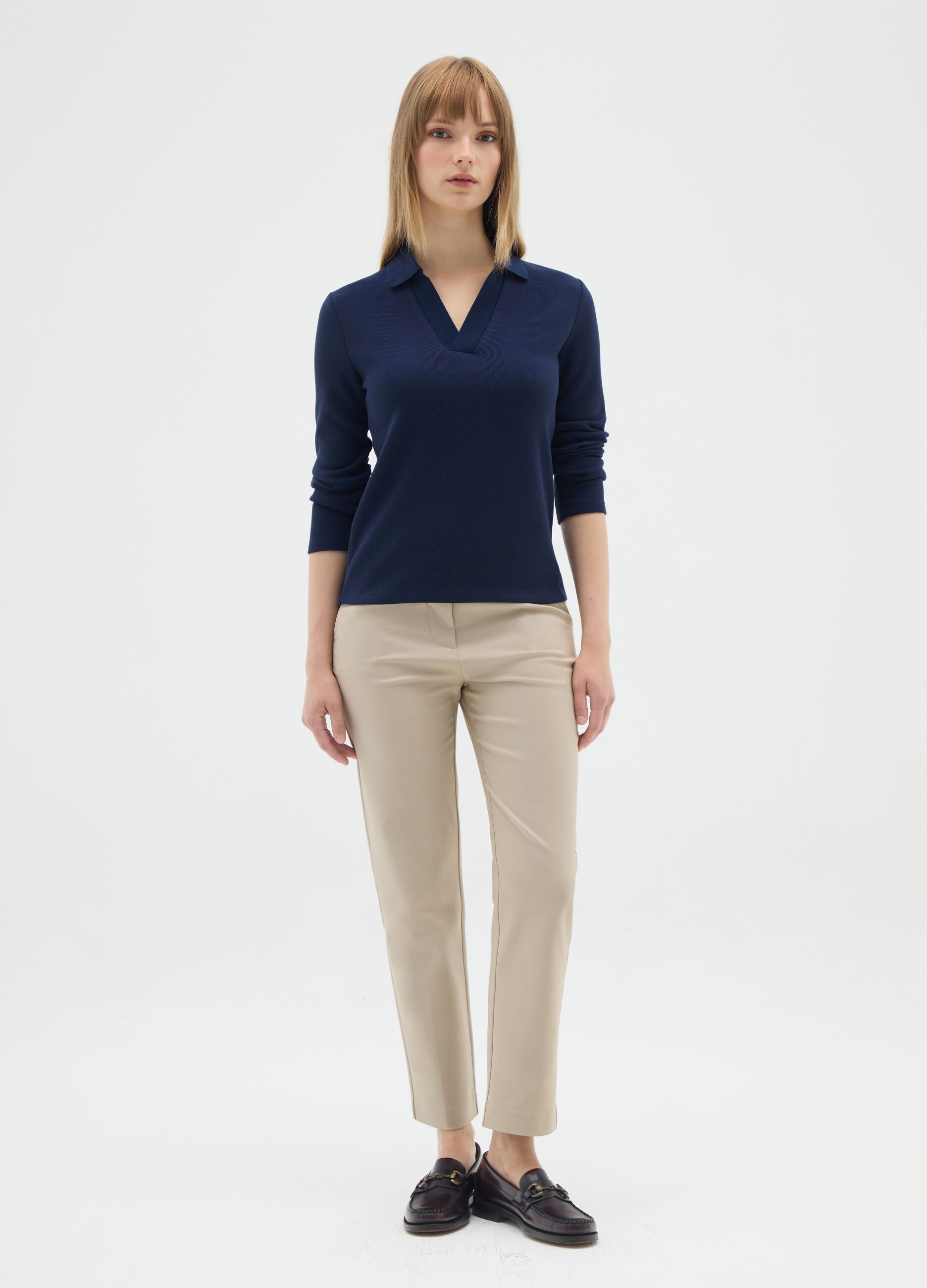 Polo blu a maniche lunghe elasticizzata
