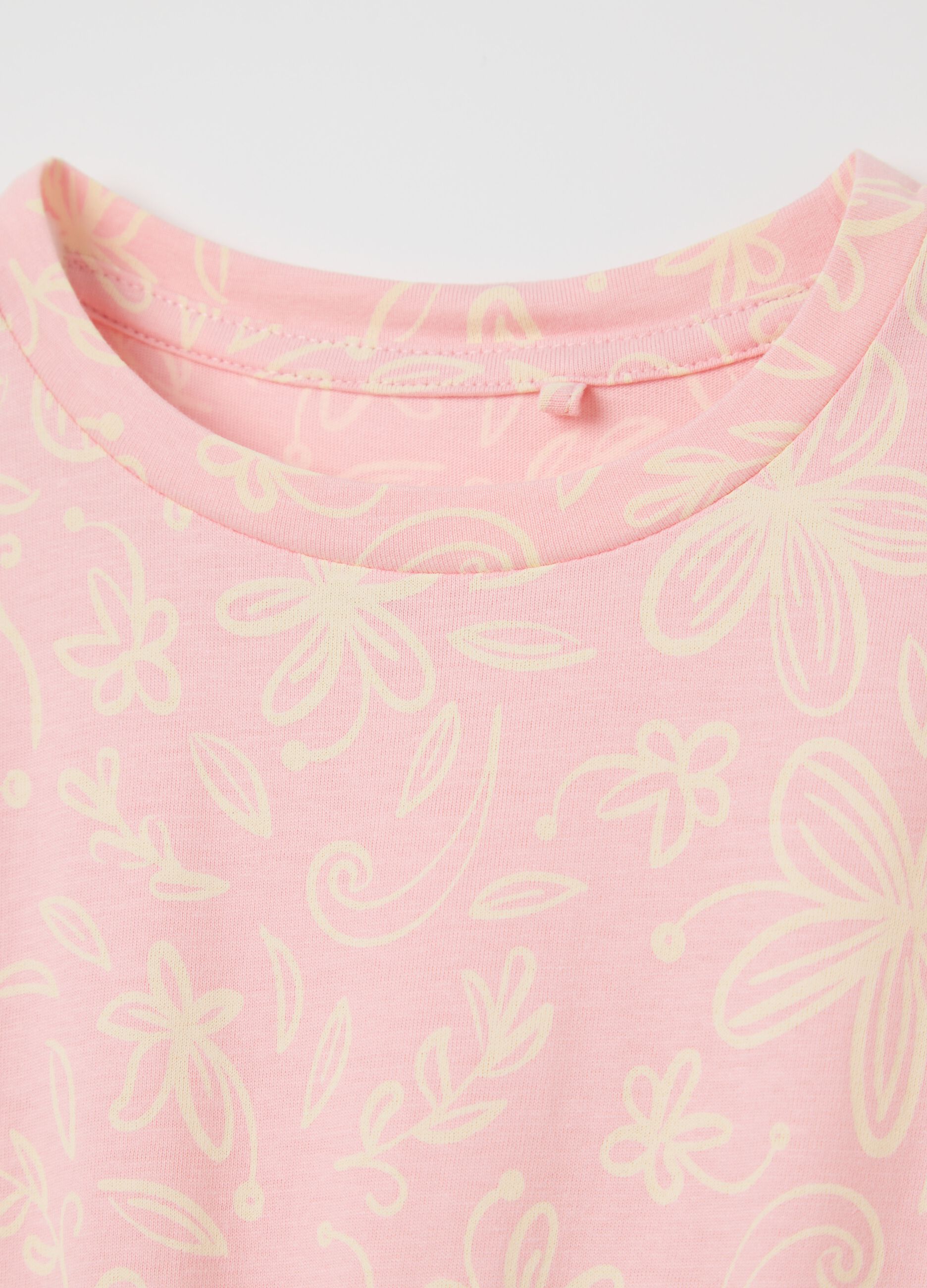 Abito senza maniche rosa con motivi floreali