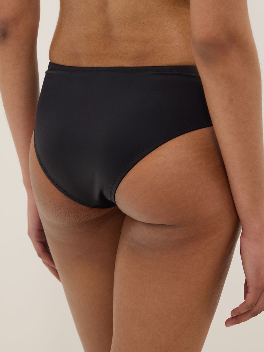 Black stretch swim briefs with side gathers_2