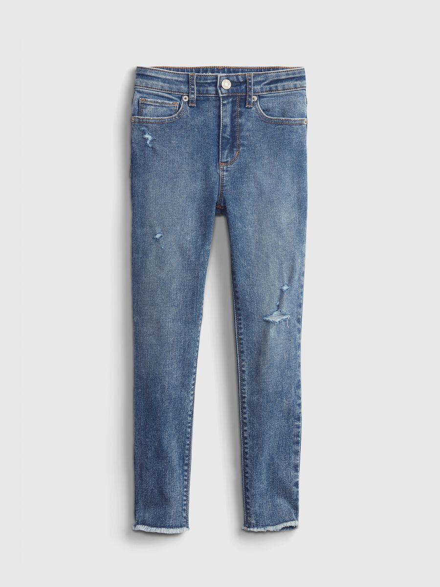 High-rise jeggings with acid wash and abrasions_1
