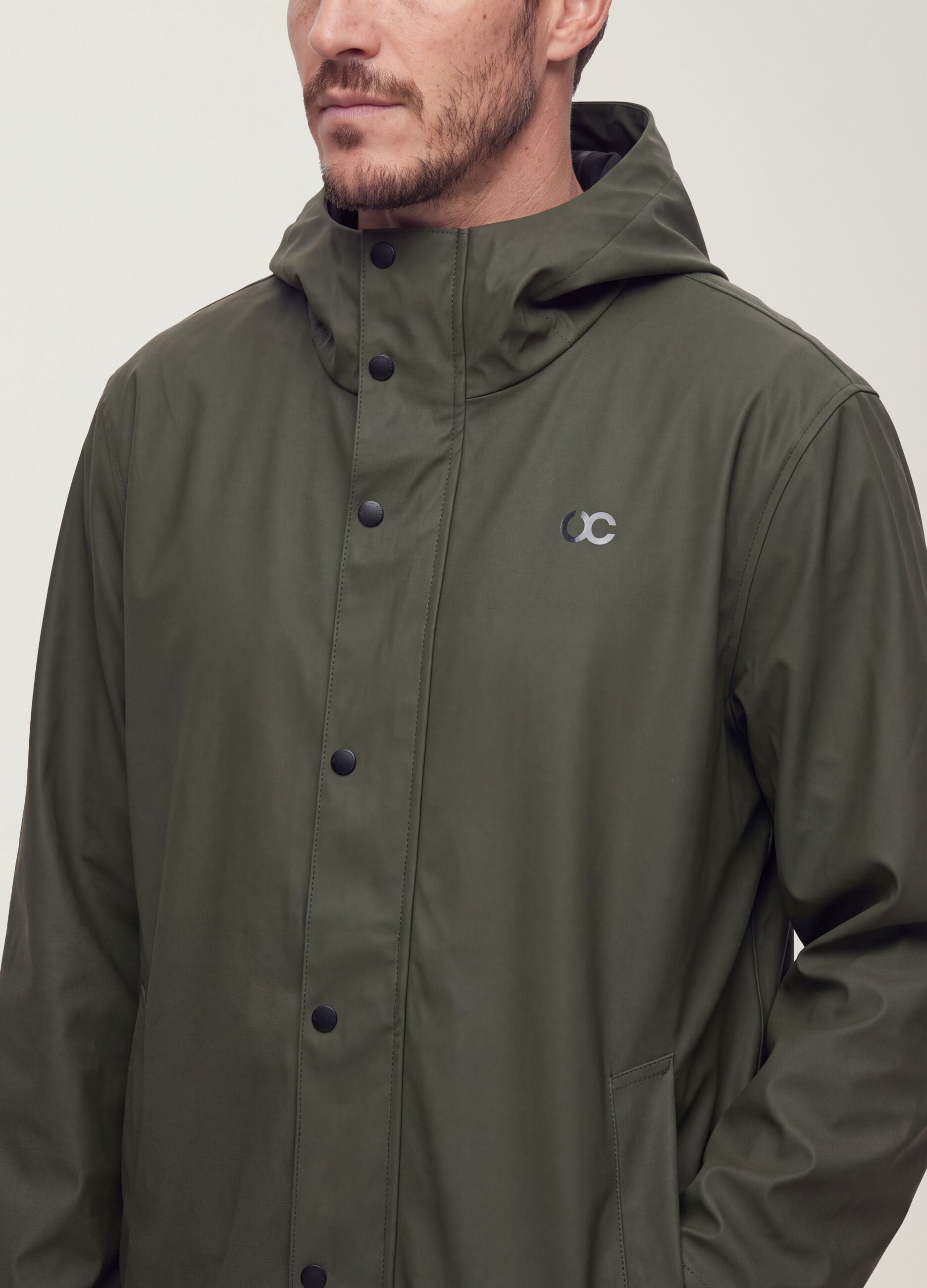 Green regular-fit raincoat with zip