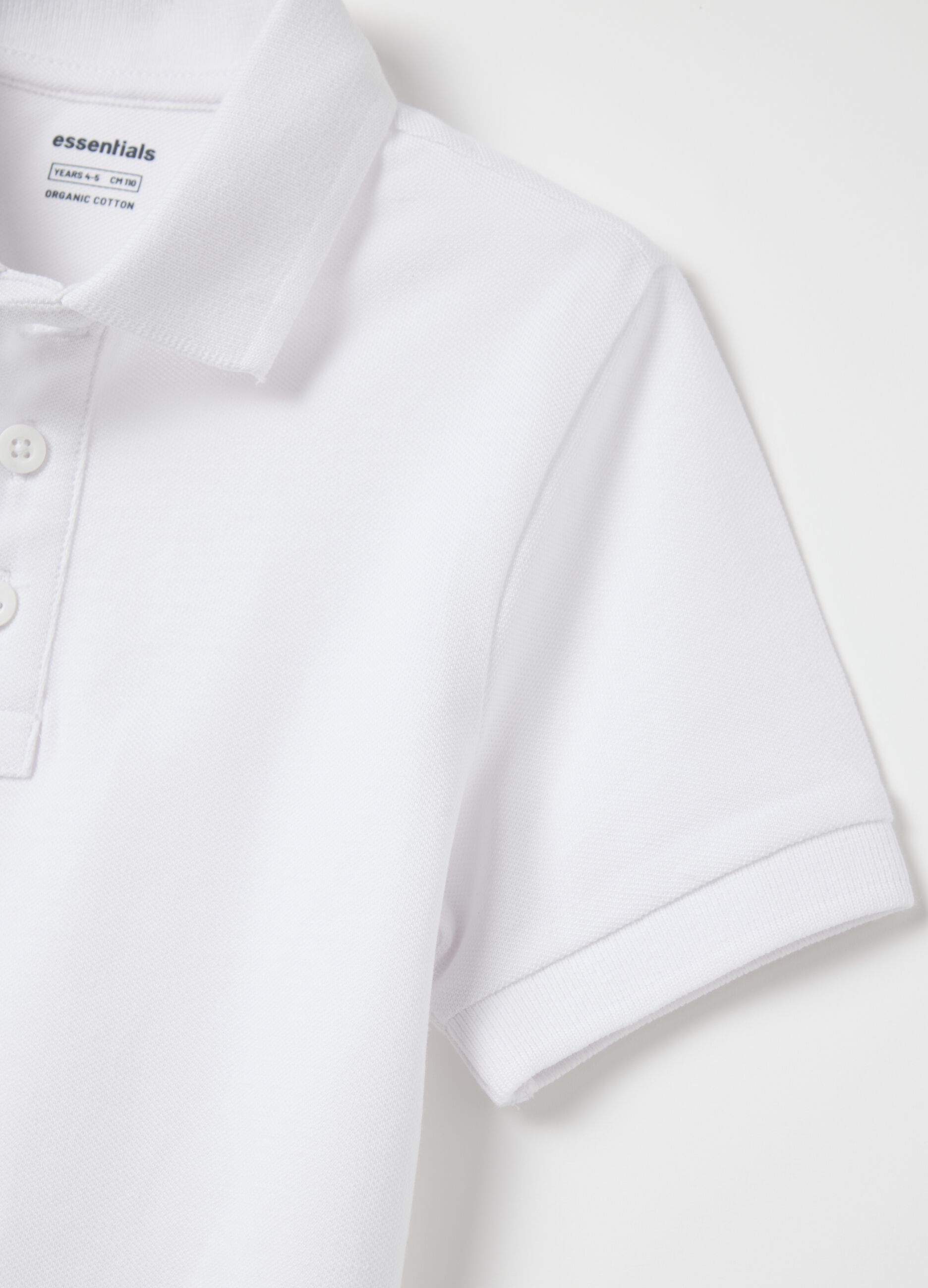 White polo shirt with short sleeves in organic cotton