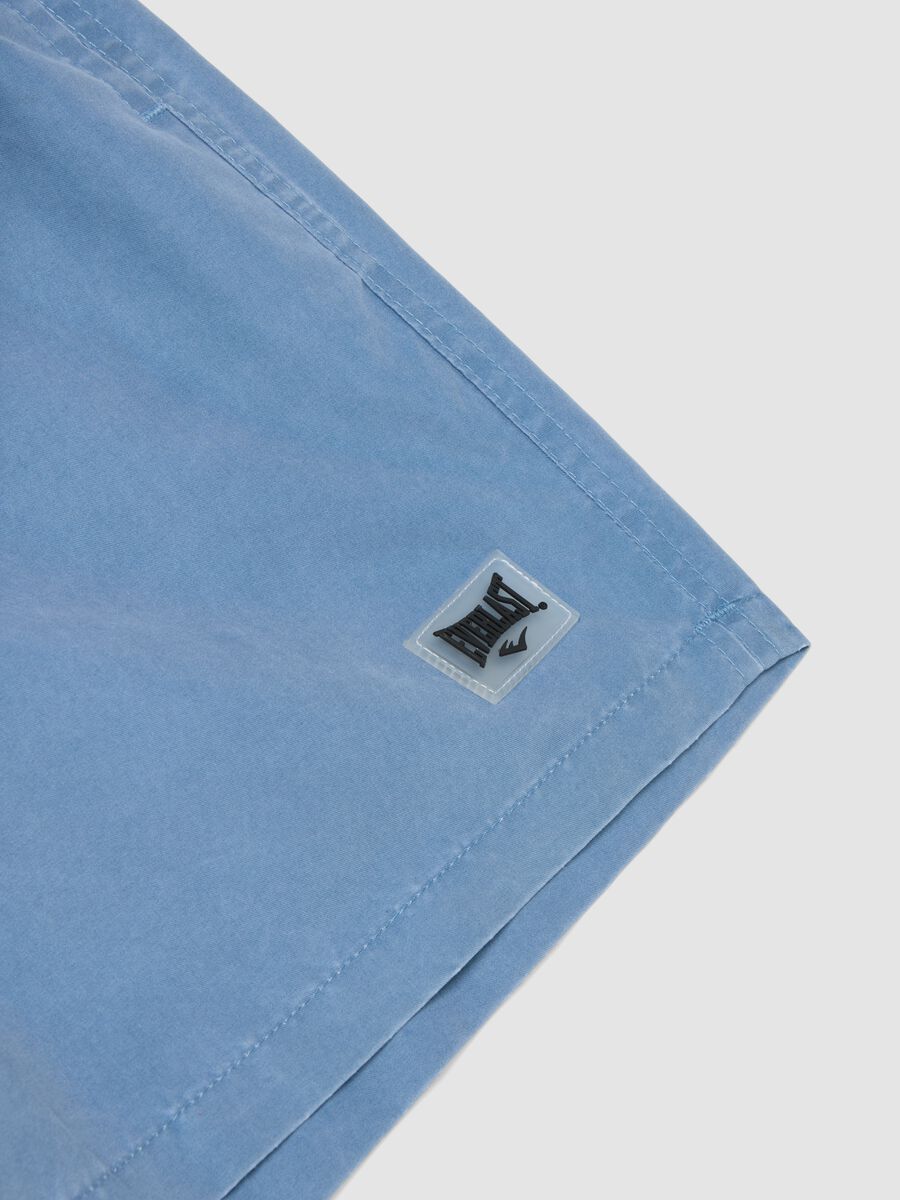 Blue swim shorts with drawstring waist_1