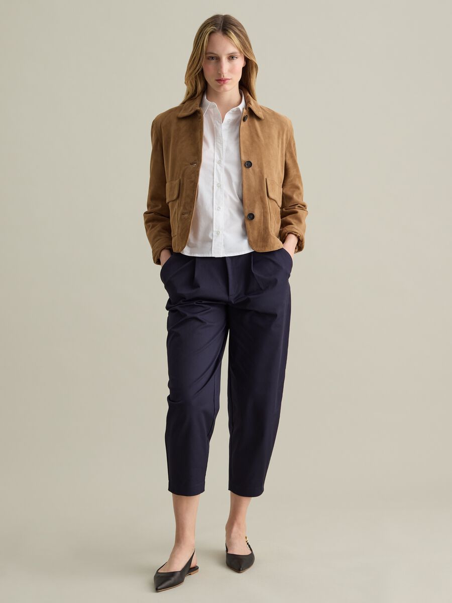 Woman's short brown jacket in real leather with regular fit and button fastening_1