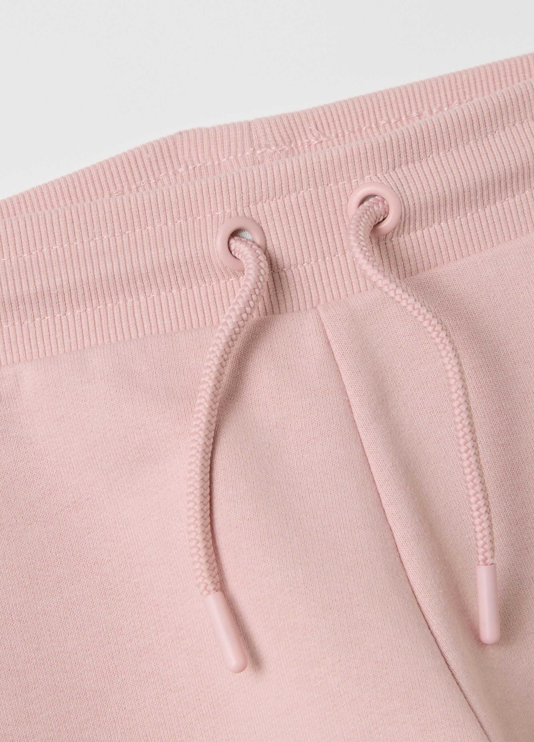 Pink joggers with drawstring and logo print with glitter details