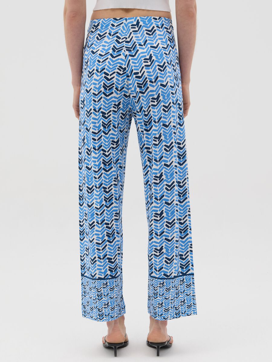 Blue jersey trousers with geometric pattern_2