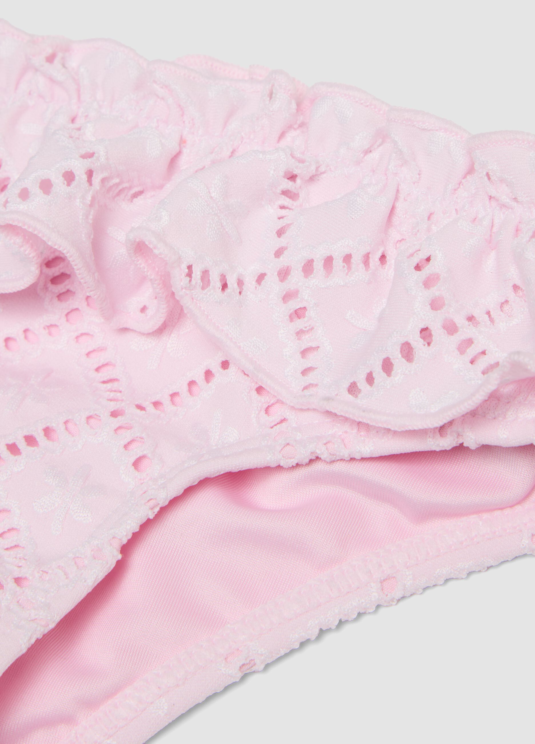 Pink stretchy bikini bottoms with frill