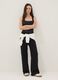 Wide-leg black stretch cotton jogger trousers_0