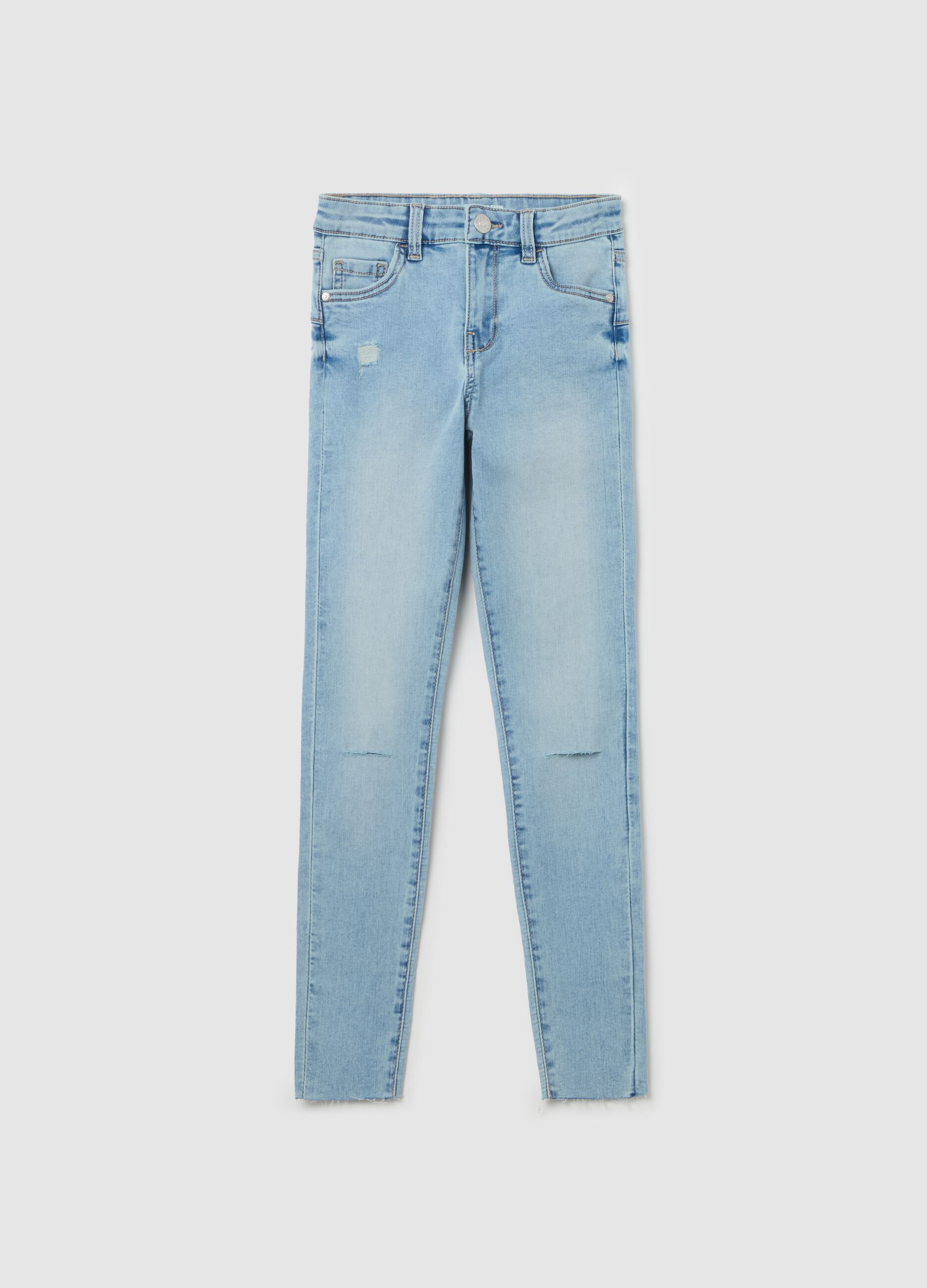 Jeans slim fit con abrasioni 
