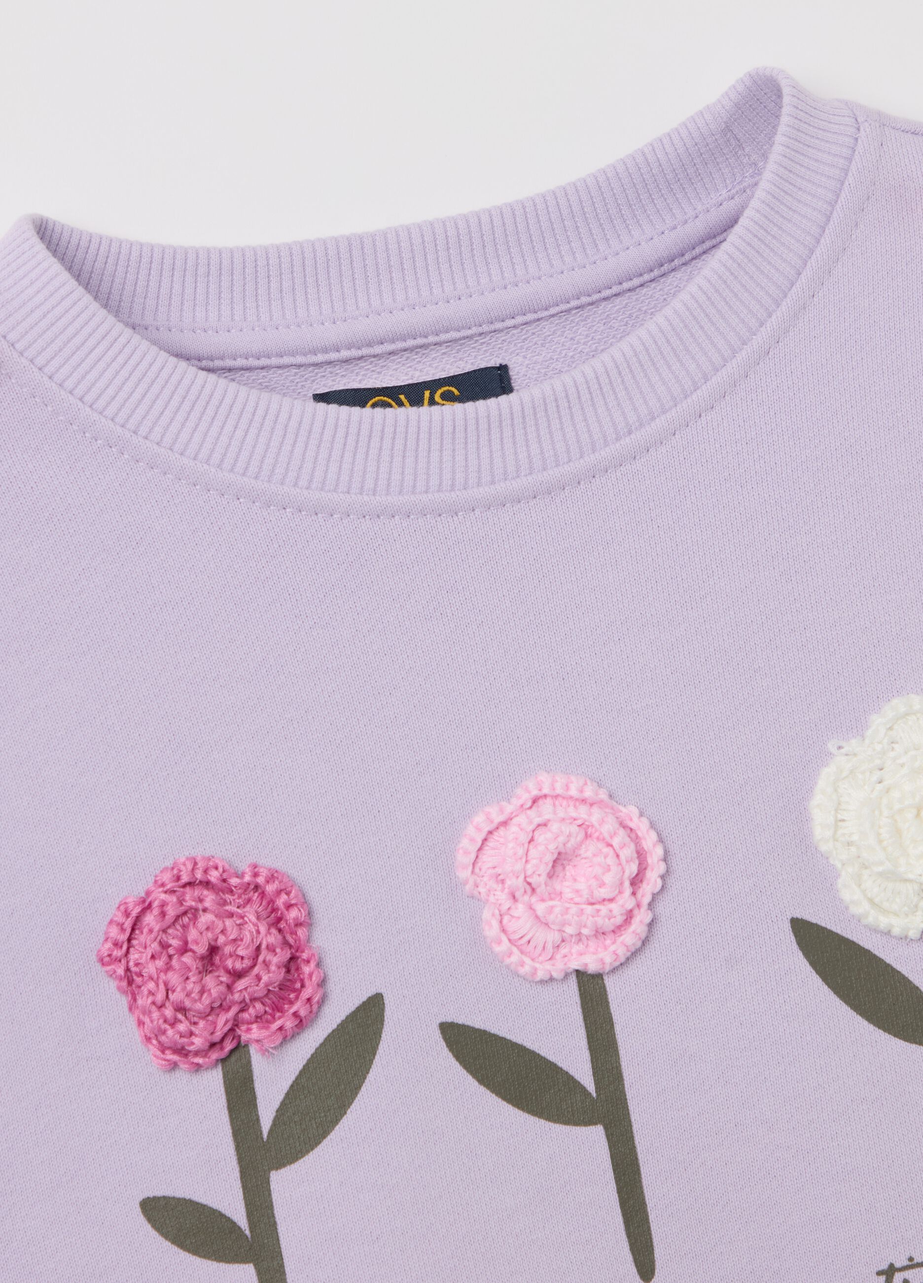 French terry sweatshirt with crochet flowers