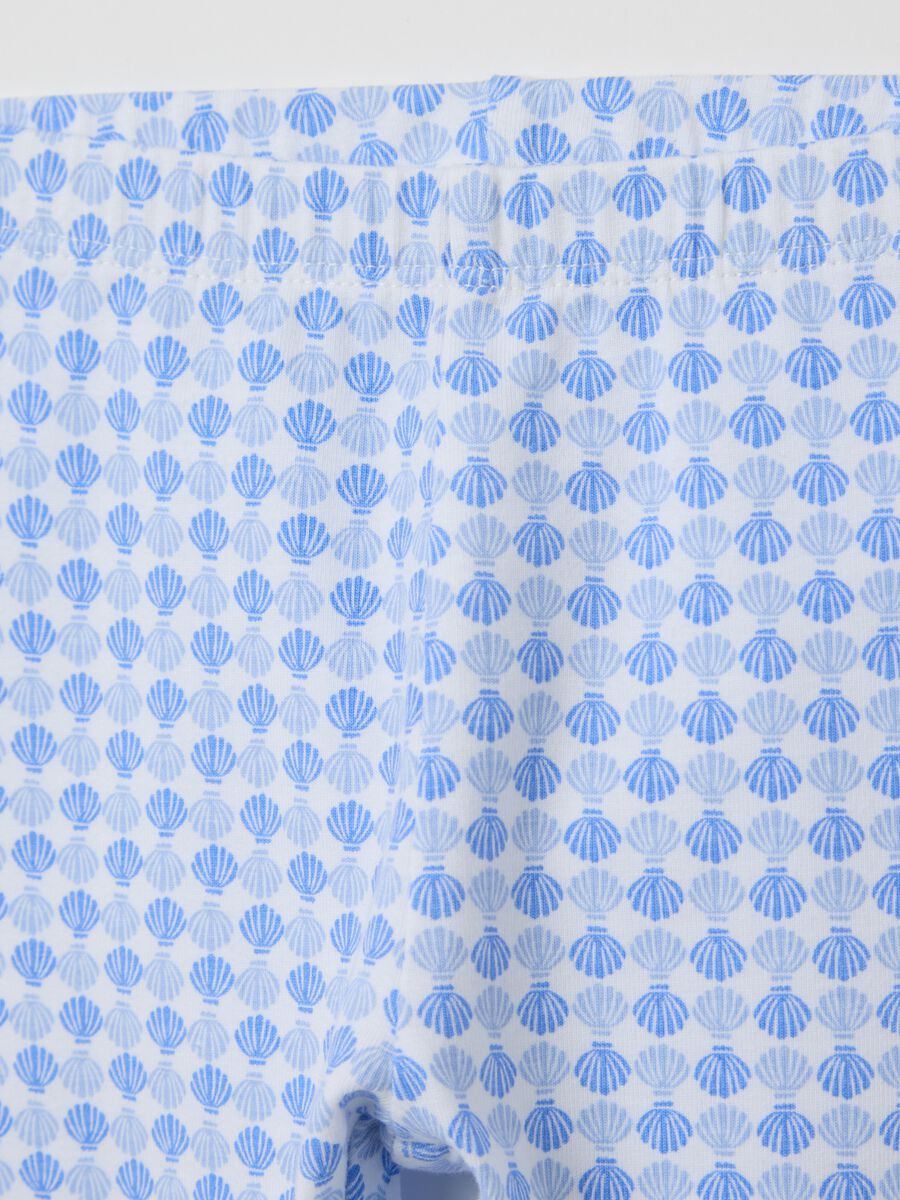 White and light blue three-quarter stretch leggings with print_2