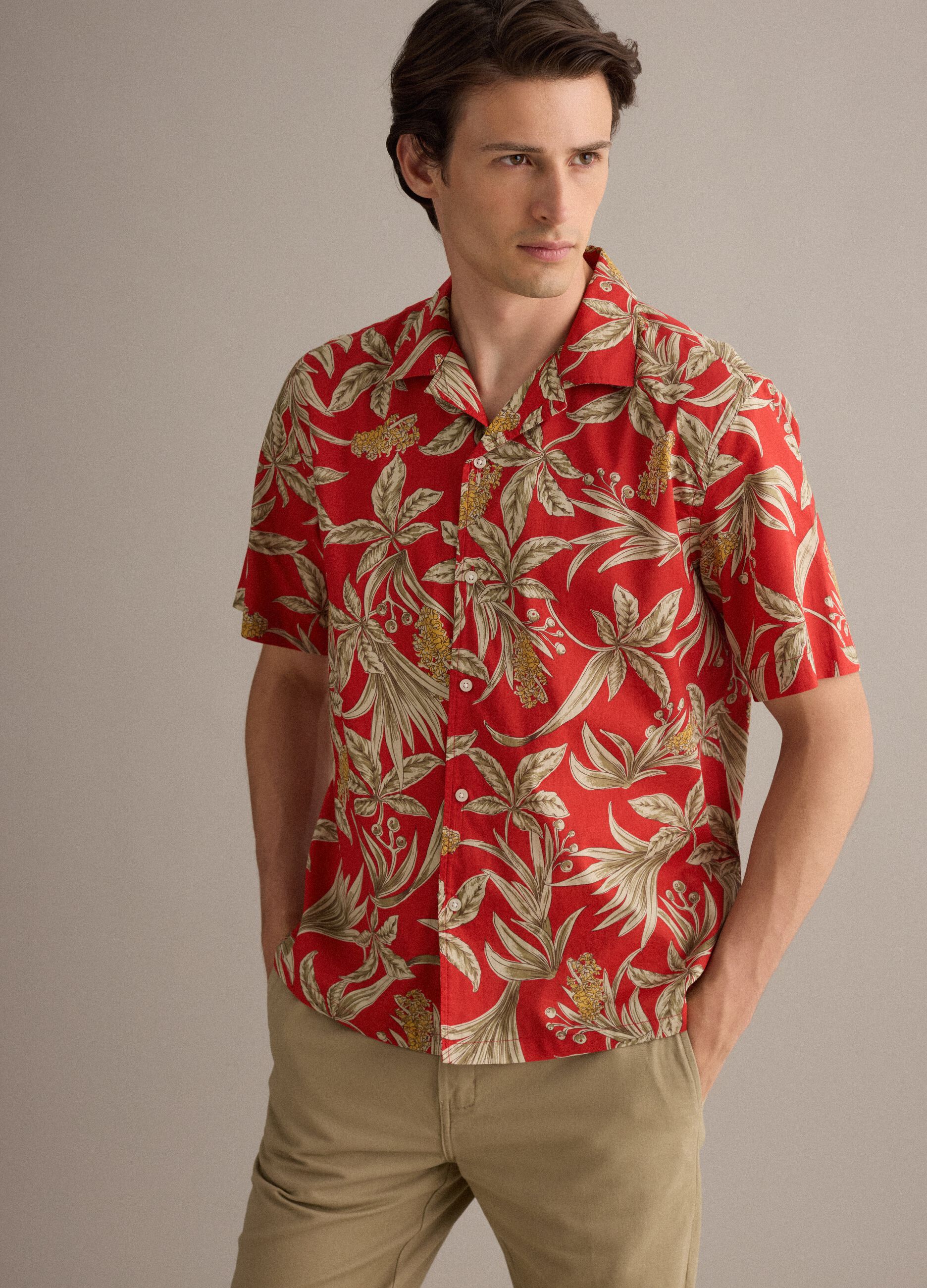 Red organic cotton shirt with tropical print