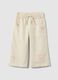 Beige wide-leg pure cotton trousers for baby girls with embroidered detailing_0