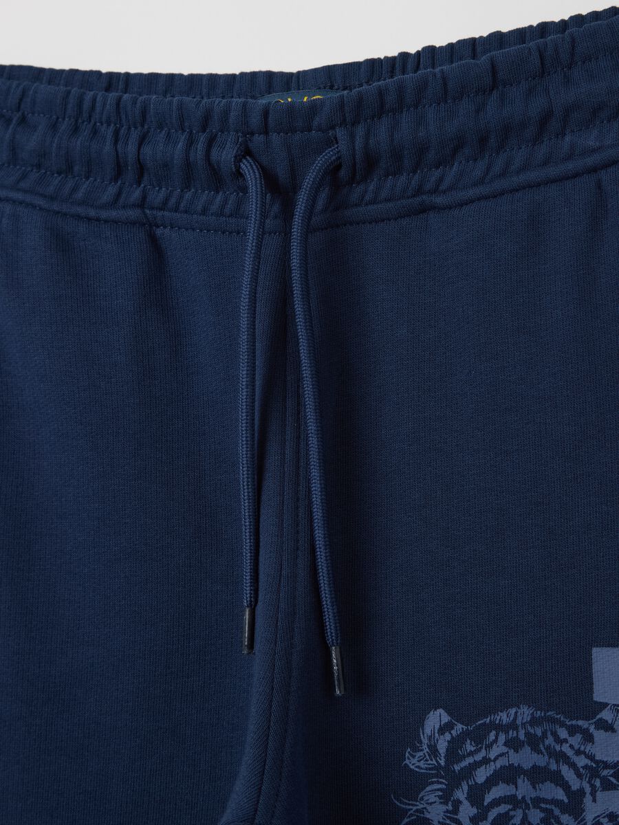 Blue cotton joggers with drawstring and print_2