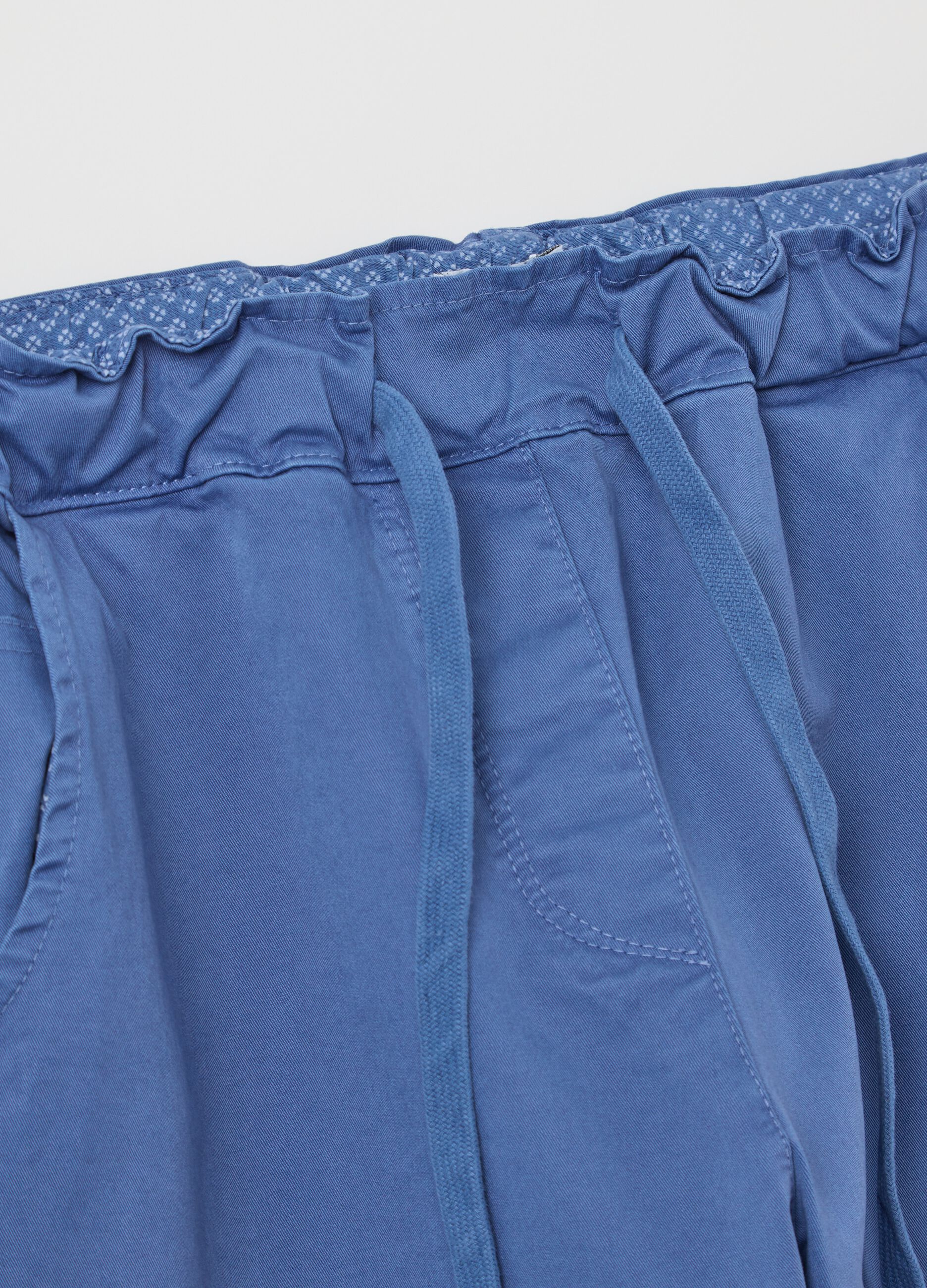 Blue stretch cotton trousers with drawstring