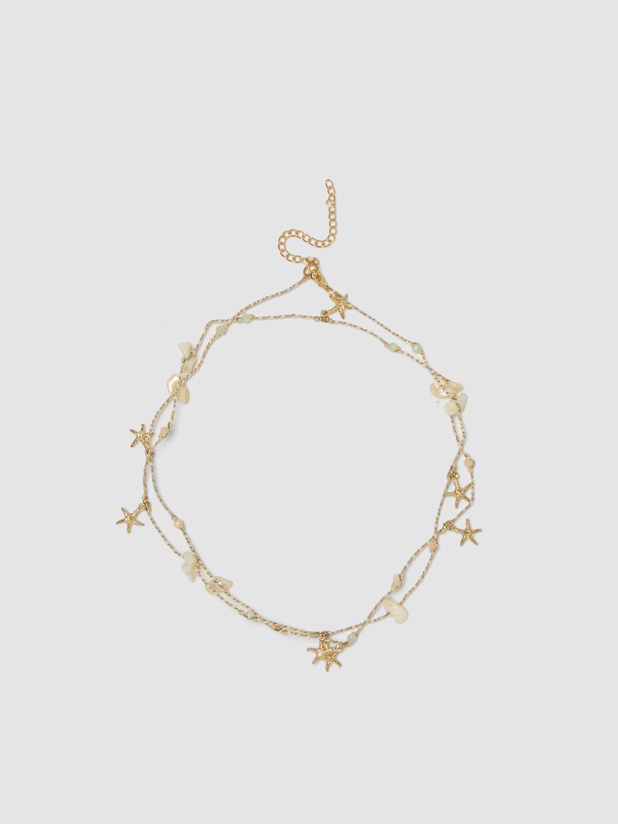 Collana beige con charms marini e pietre_0