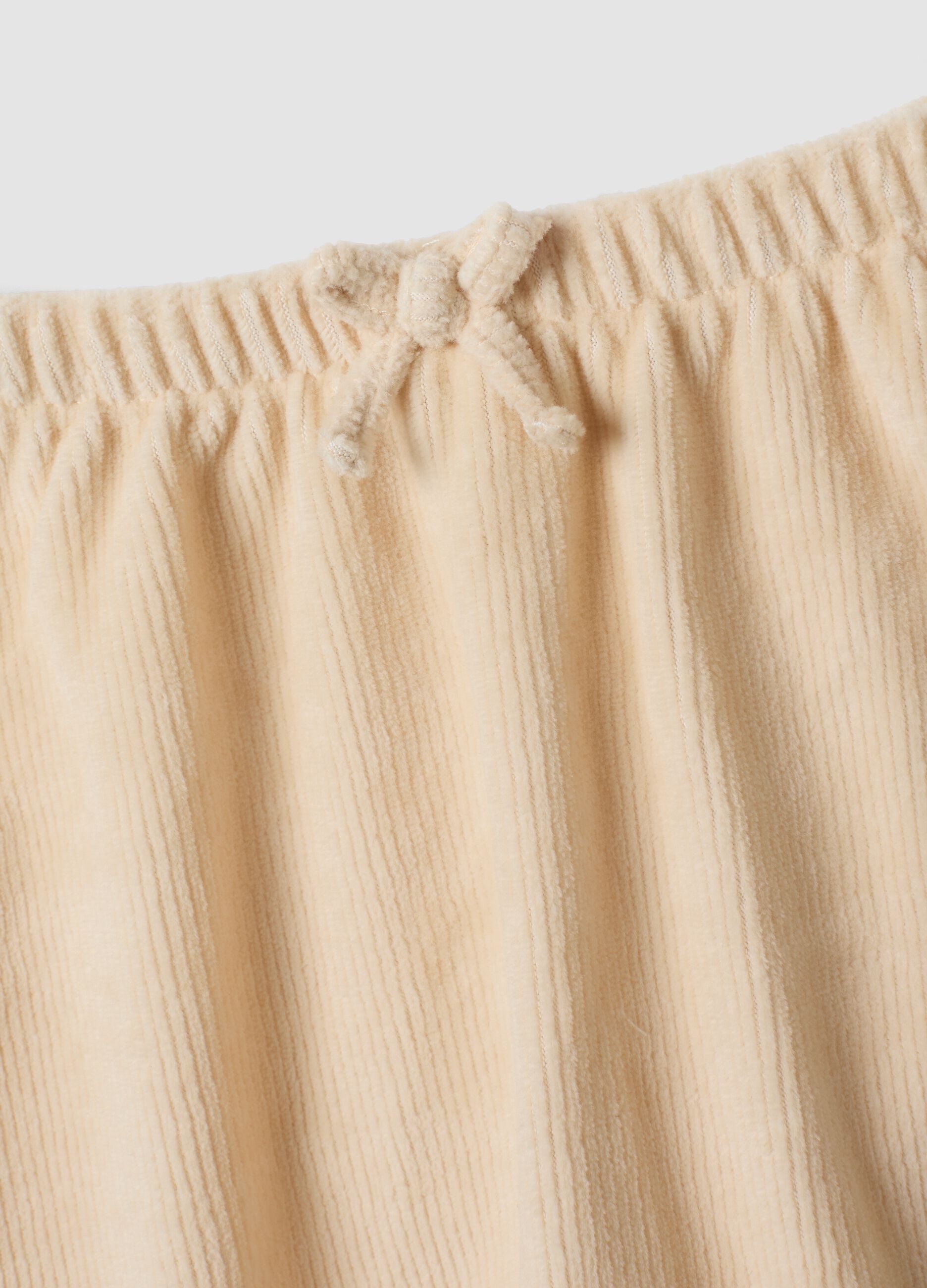 White two-piece set in pure organic cotton with Winnie the Pooh print