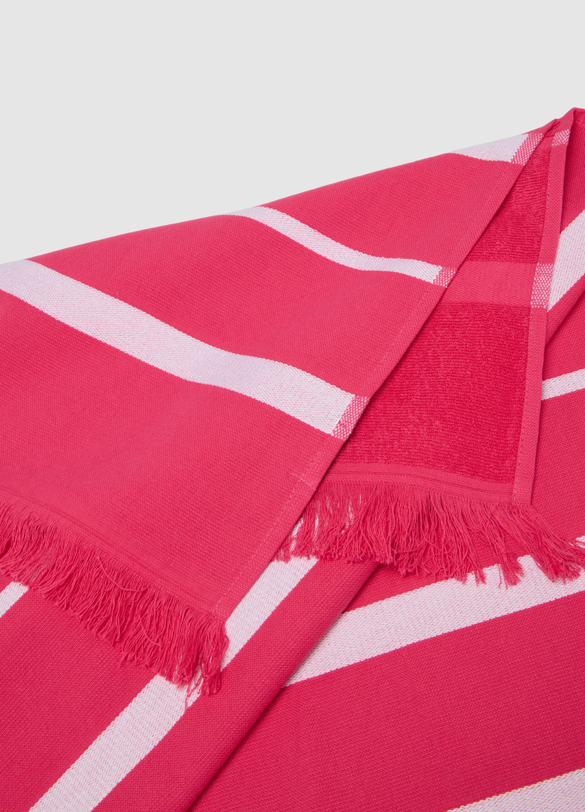 Telo mare da donna in cotone rosa con frange