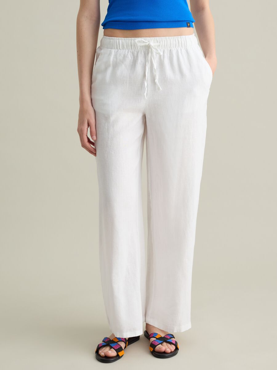 White wide-leg fluid trousers in linen_1