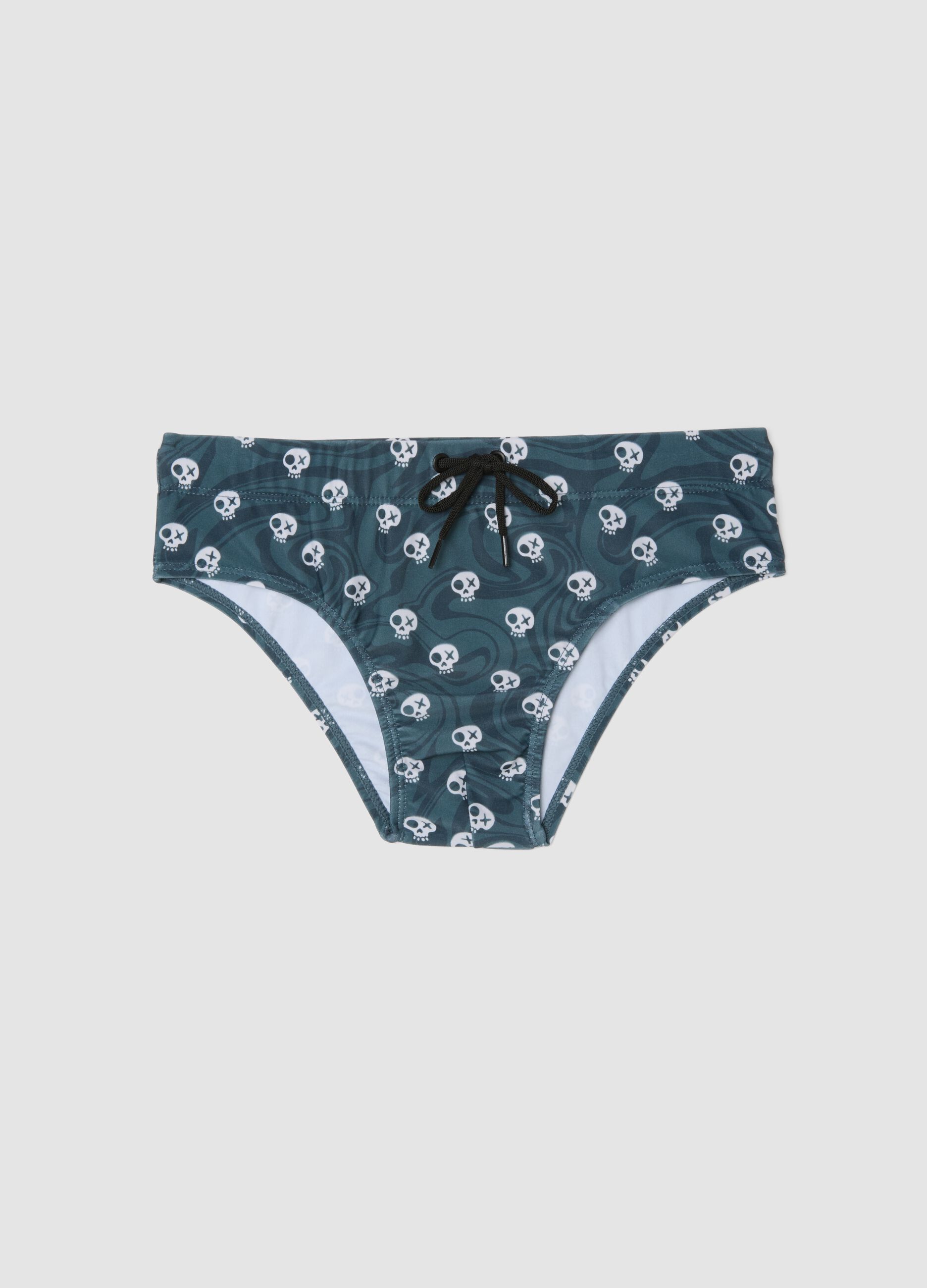 Blue stretch swim briefs with skull print
