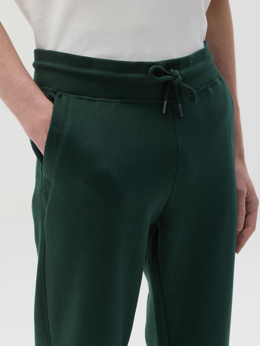 Fleece joggers with pockets and drawstring_2