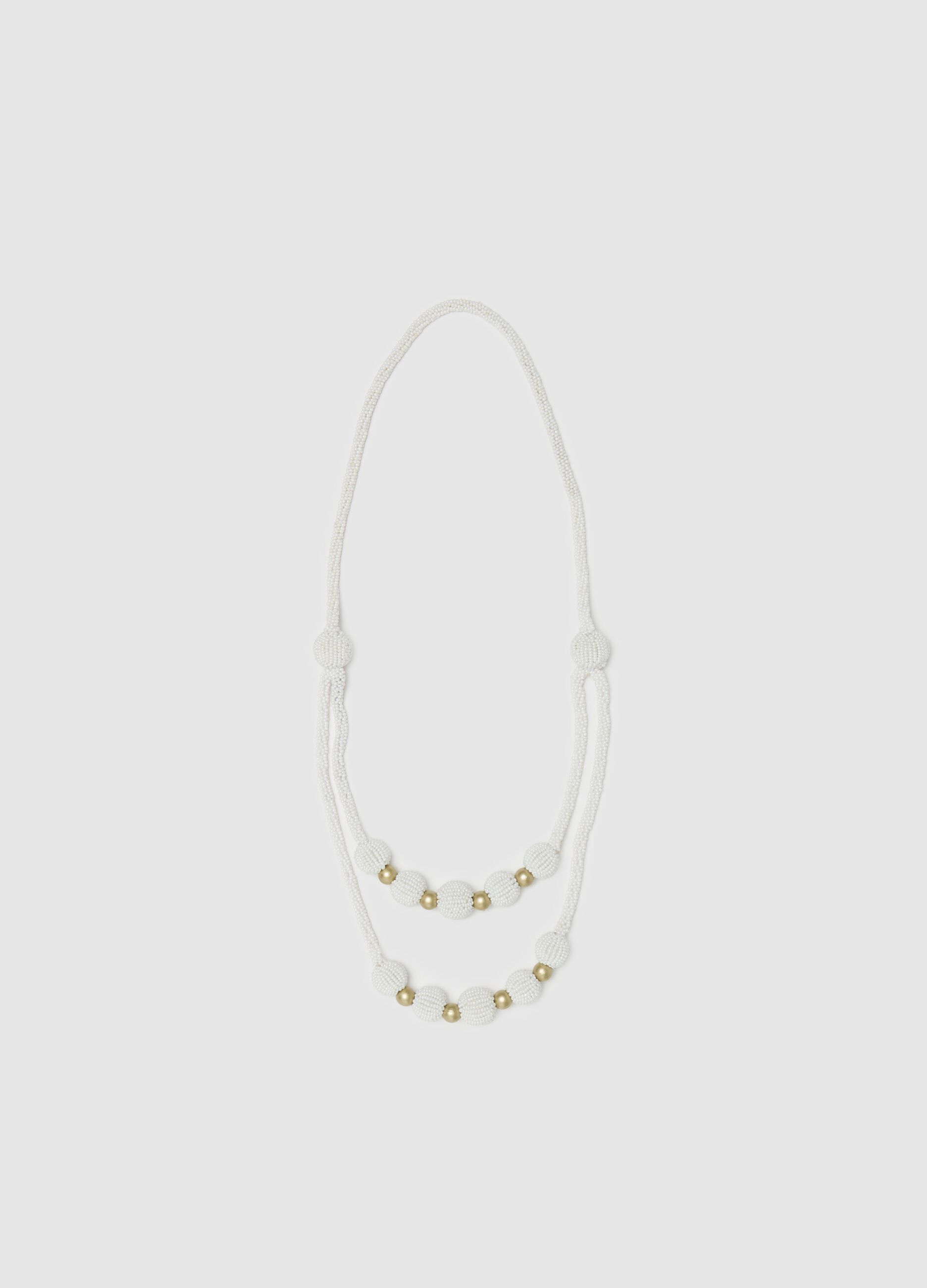 Beaded necklace with gold details