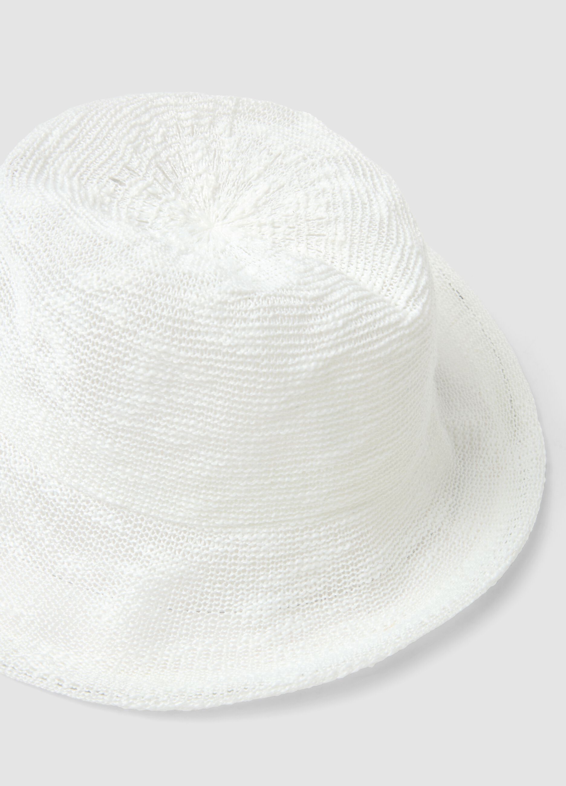 White knitted bucket hat