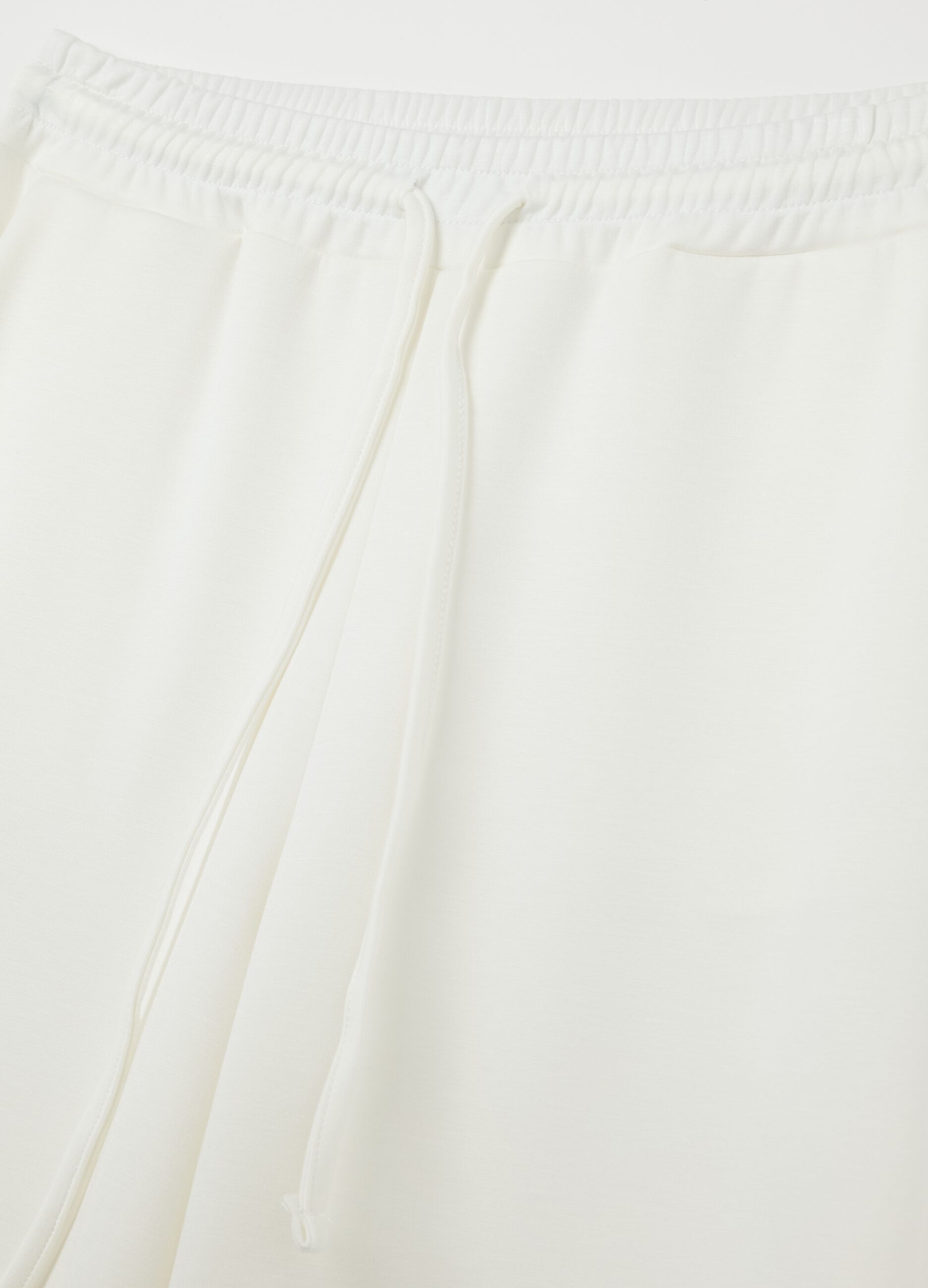 White palazzo trousers in stretch fabric